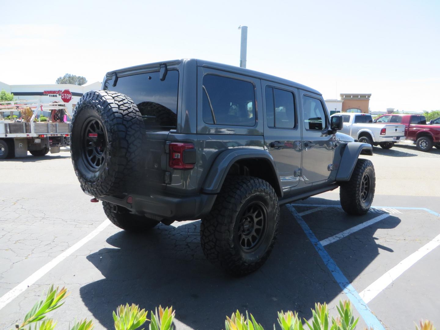 2021 Sting Grey /BLACK Jeep Wrangler Unlimited Rubicon (1C4JJXFM5MW) with an 3.0L V6 DOHC 24V TURBO DIESEL engine, 6A transmission, located at 2630 Grass Valley Highway, Auburn, CA, 95603, (530) 508-5100, 38.937893, -121.095482 - Diesel JL with Sky One power top featuring a Teraflex suspension system, Falcon adjustable shocks & steering stabilizer, Full Metal Cloak skid plate, 17" Method bead grip wheels, 37" Toyo RT Trail tires, Warn winch, Rigid Led lighting, Teraflex HD spare tire carrier, Teraflex Diff covers, Amp steps, - Photo#4